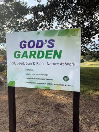 A community garden sponsored by Knox County Community Garden & Growers Alliance, promoting healthy growth with soil, seeds, sun, and rain, situated at Knox County.